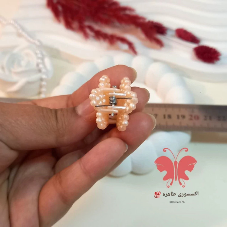 کلیپس مو گل بسته 3 عددی کد 396