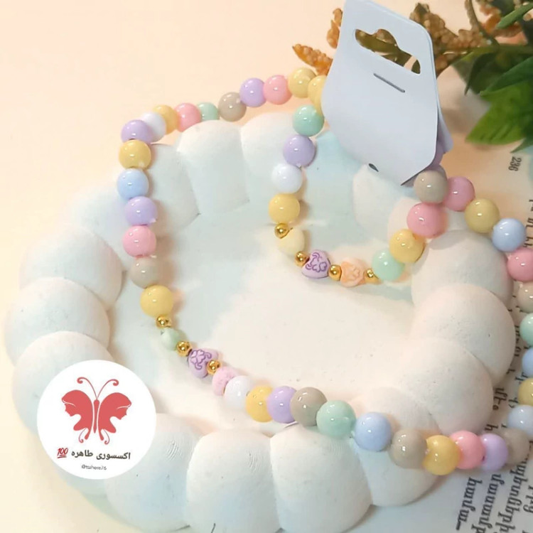 ست دستبند و گردنبند مرواریدی رنگی گلدار و قلبی حرف م حرف د حرف س