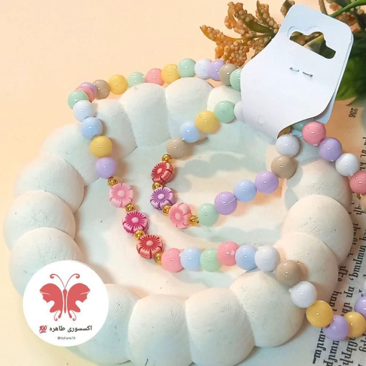 ست دستبند و گردنبند مرواریدی رنگی گلدار و قلبی حرف م حرف د حرف س