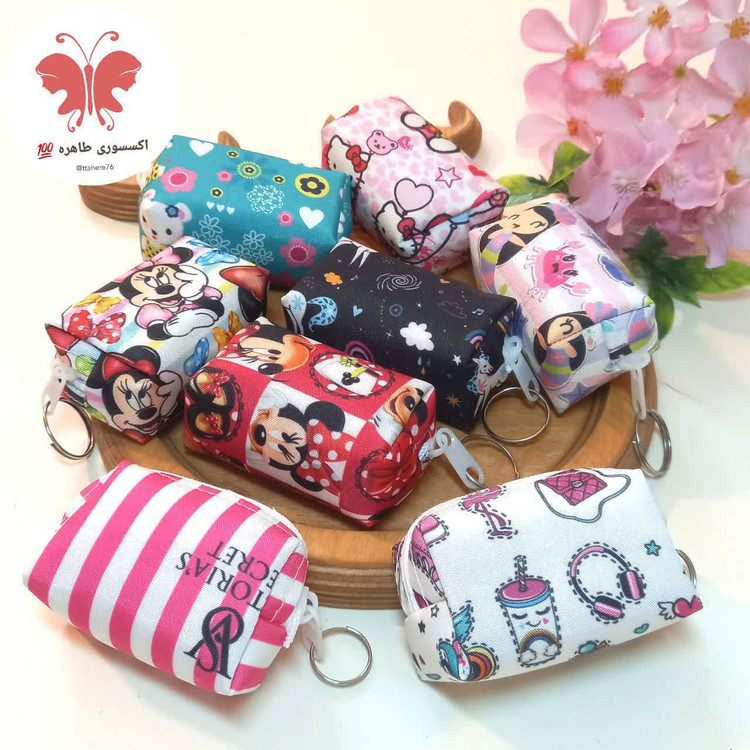 کیف پد آرایشی و کیف هندزفری کوچک بابونه و عروسکی